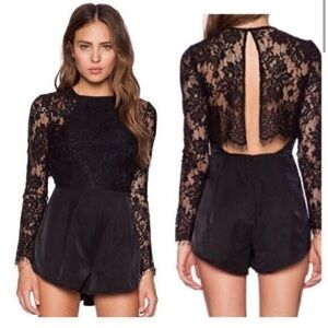 Revolve The Jetset diaries climbing the wall romper lace open back size medium